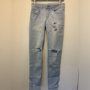 Women’s American Eagle Outfitters Super Stretch Skinny Distressed (Light Blue)